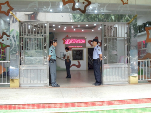 Typical grade school entrance, well guarded.